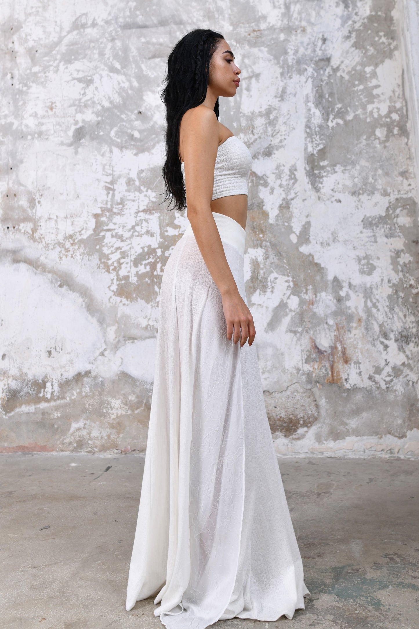 White sexy and dramatic split design, high-quality rayon fabric, comfortable elastic waistband, range of colors, one size fits most, effortlessly chic bohemian style, summer festivals, beach parties, versatile dress up or down style, boho goddess skirt, grecian goddess skirt, bohemian style