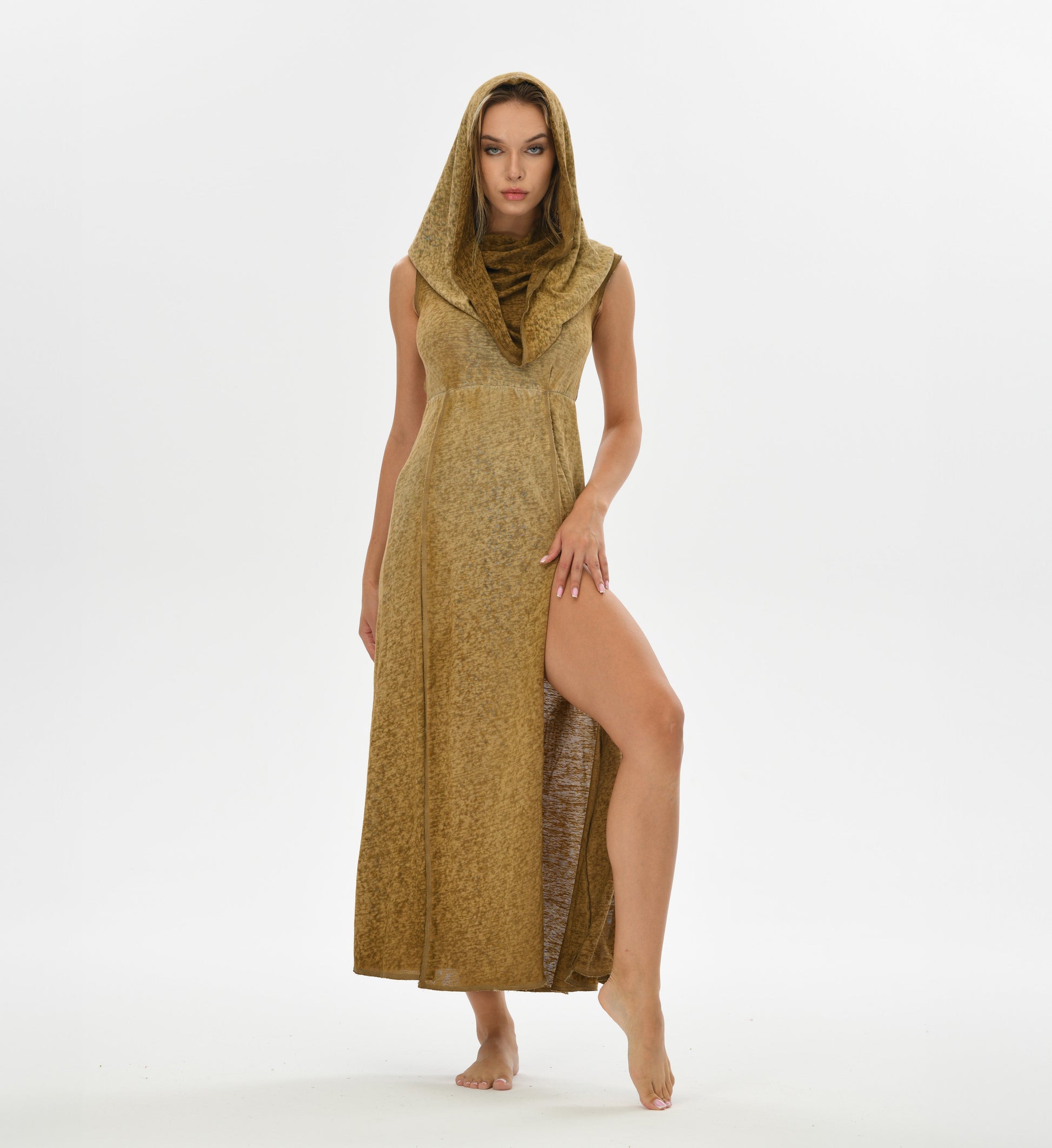 Bohemian goddess dress with a hood that doubles as a shawl, open back, and side splits. Hand-dyed with natural root dyes for a unique look, made from cotton and linen.
